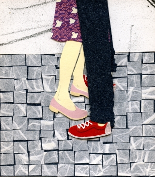 Fragment of a girl and a boy embracing on a street.