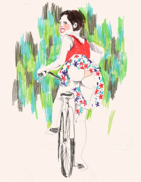 Woman on a bicycle wearing skirt 