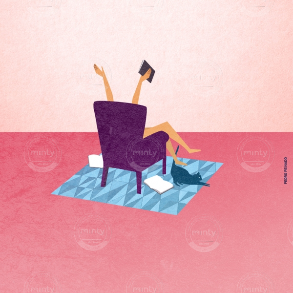 chica leyendo en sillón