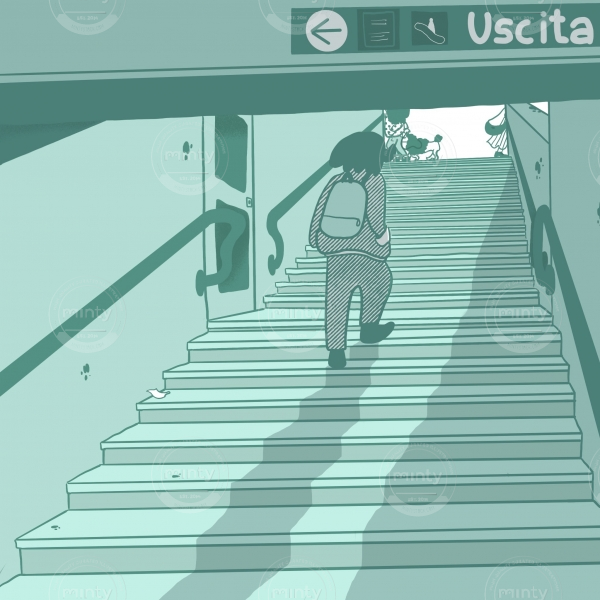 A boy walking out of the underground