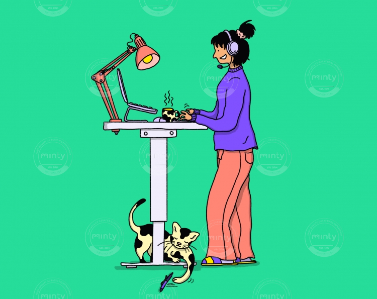 A woman is working at home on a standing desk.