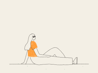 Woman lays on the ground to enjoy the sun in spring.gif