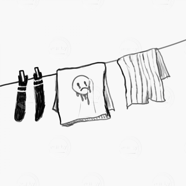 clothesline with socks, a t-shirt with a sad smiley and a striped tea towel drying with the wind